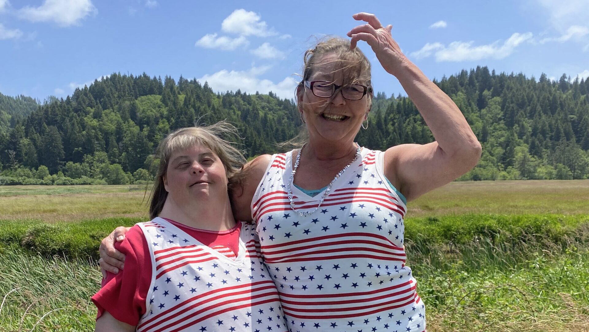 two women hugging and smiling