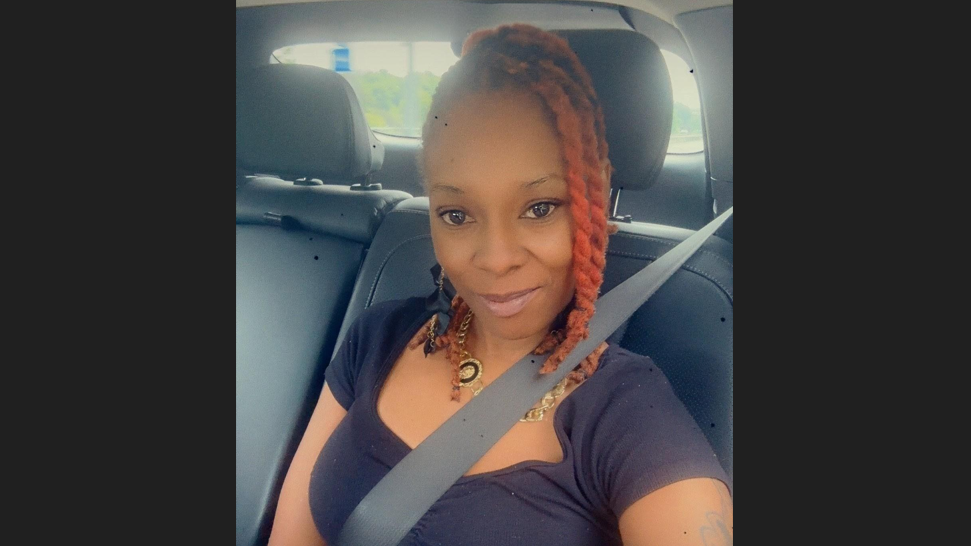 photo of PPL employee Antonia C. smiling in her car