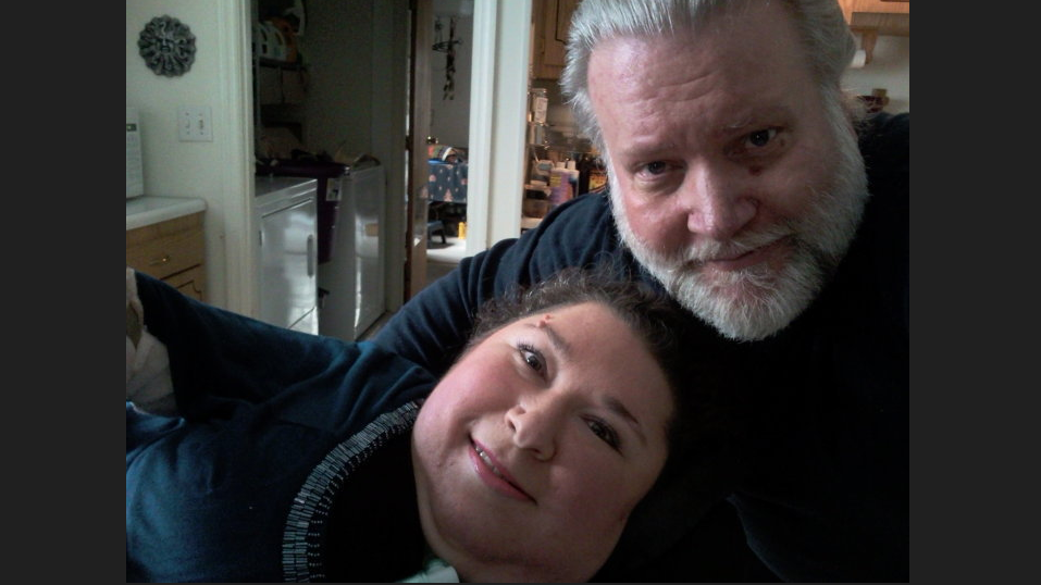 woman and her male partner embracing one another